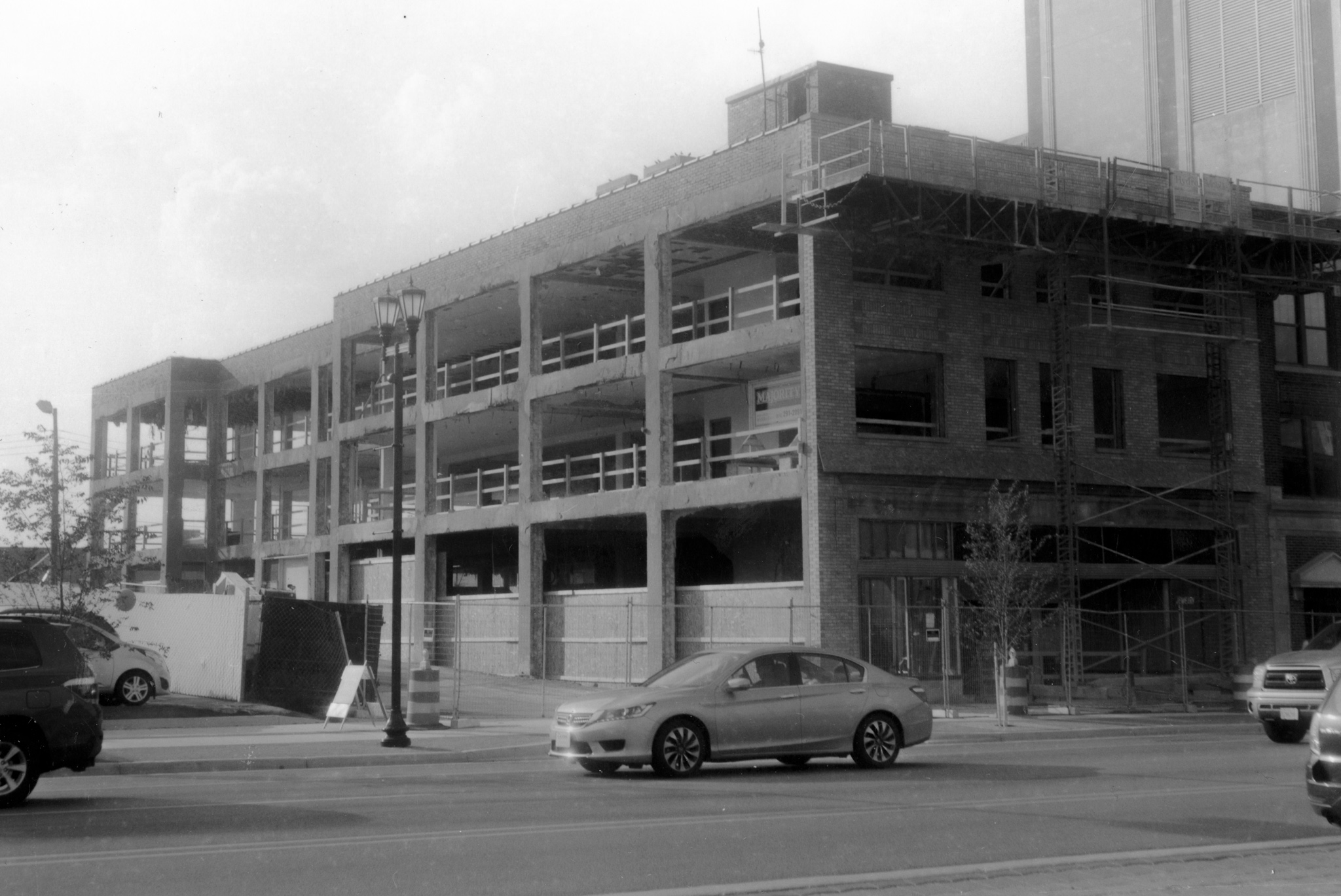 A mid-construction photograph of The Hibberd from across Main Street.
