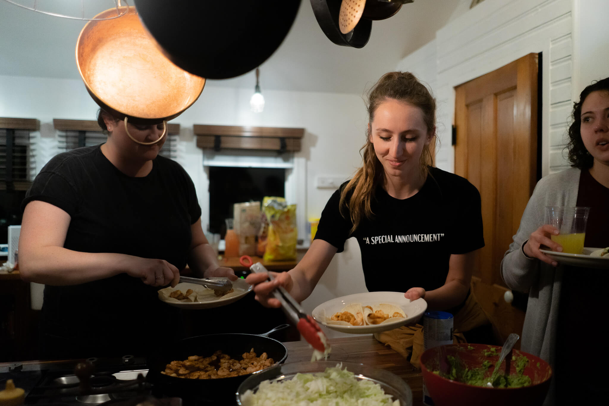Helen Cramer wears “A Special Announcement” tee while enjoying another dinner by Kathryn Keur, or “Kath Makes Food”.