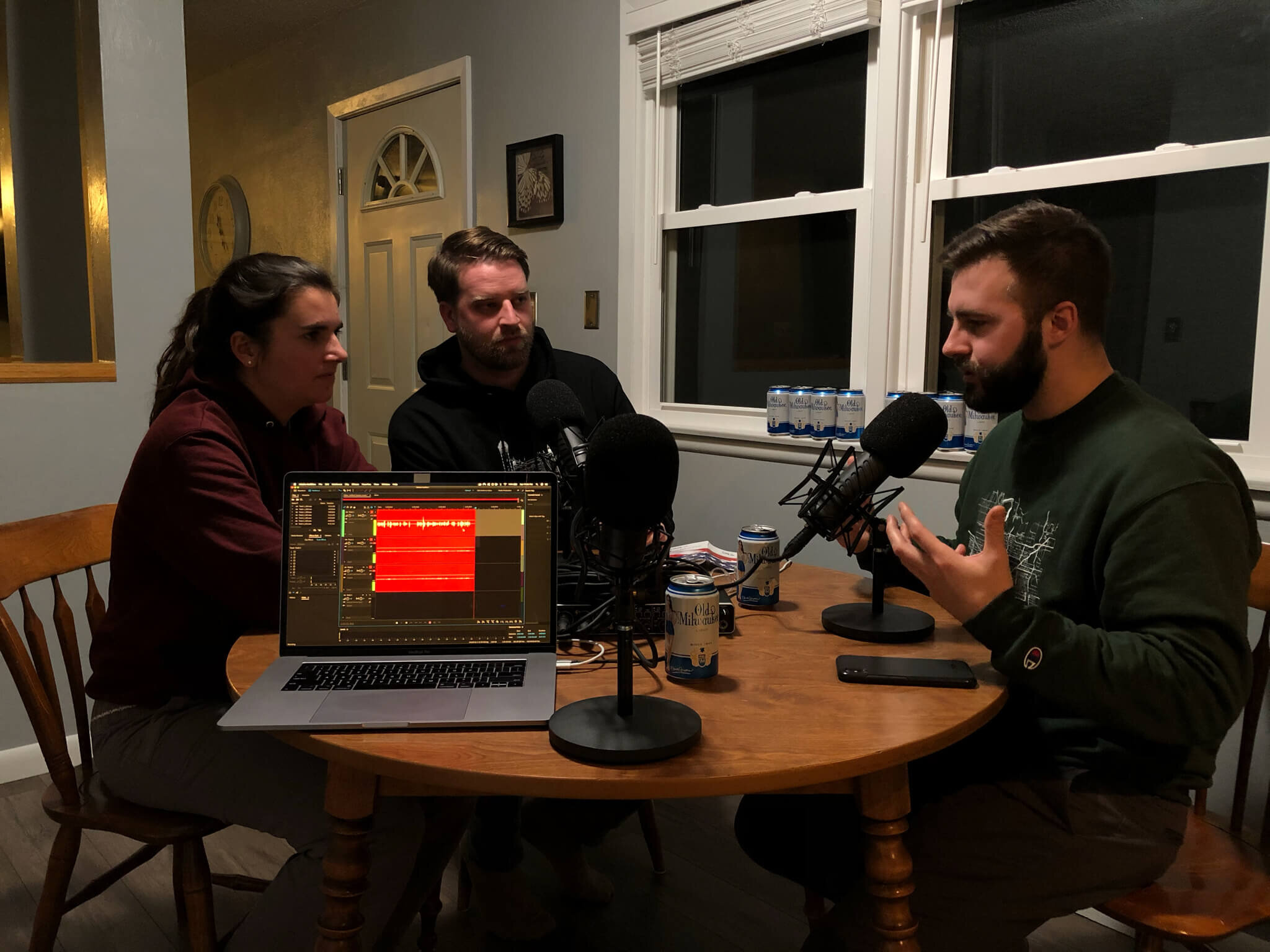 Recording around the kitchen table. (Maria, Dustin, John)