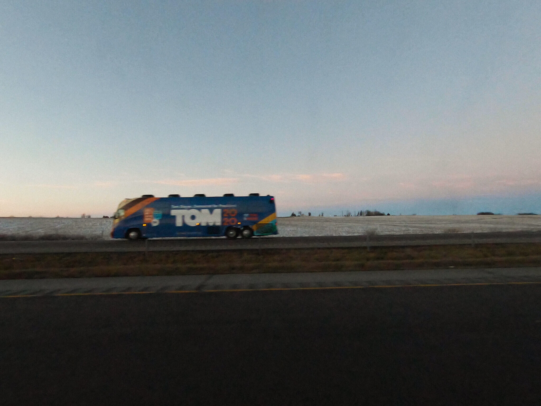 Passing Tom Steyer’s campaign bus on the road back to Cedar Rapids.