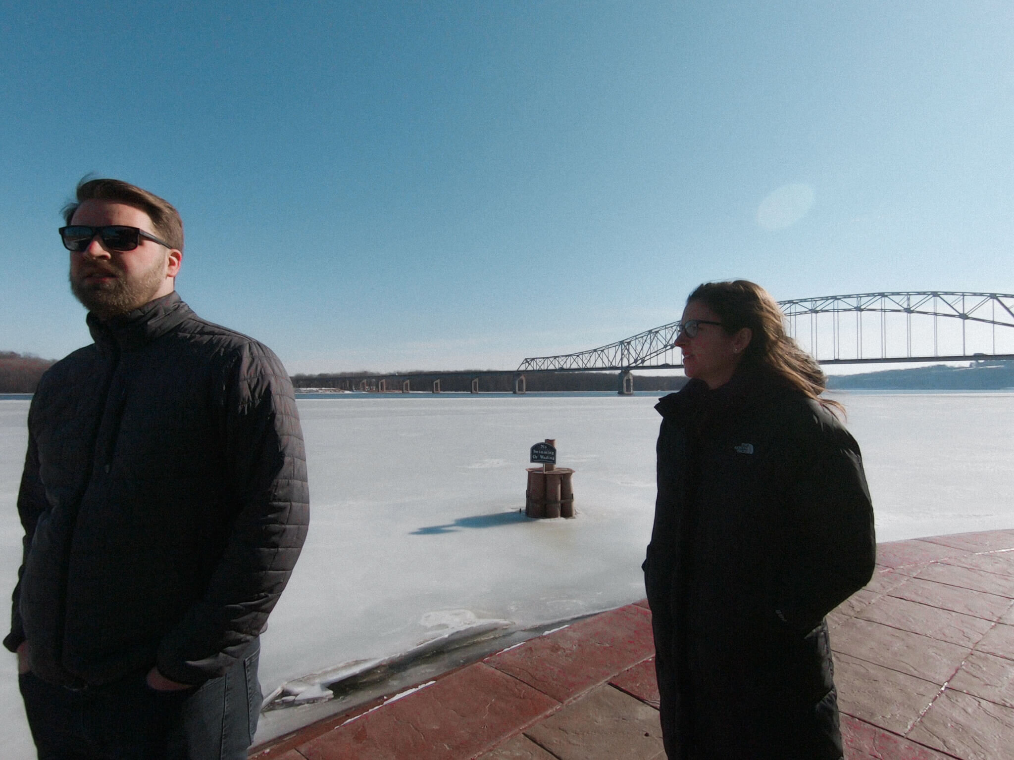 Dustin Mix and Maria Gibbs in front of the Mississippi River.