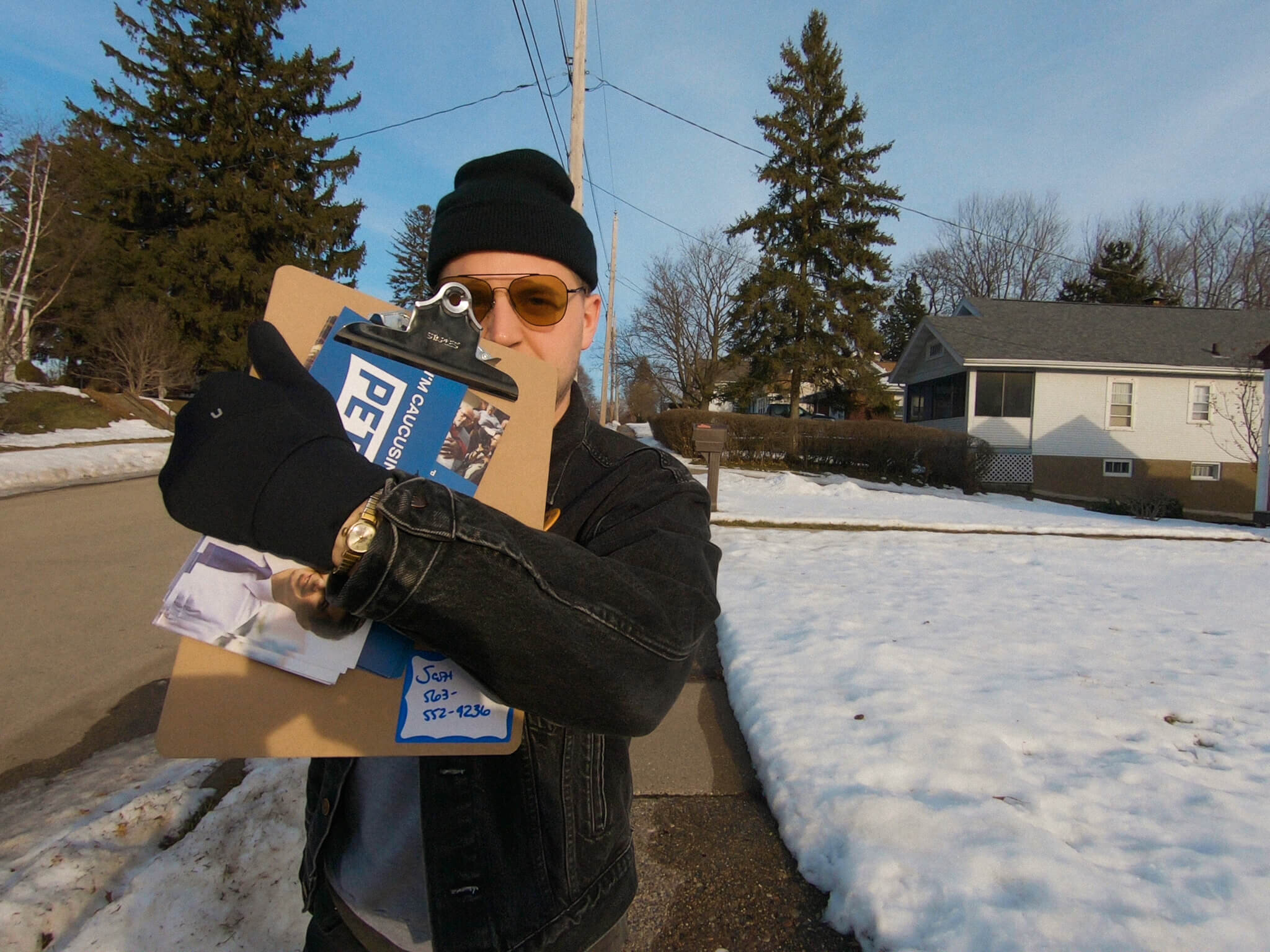 Jacob with Mayor Pete canvassing materials.
